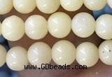 CTG1596 15.5 inches 4mm round yellow jade beads wholesale