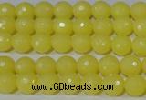 CTU2524 15.5 inches 6mm faceted round synthetic turquoise beads