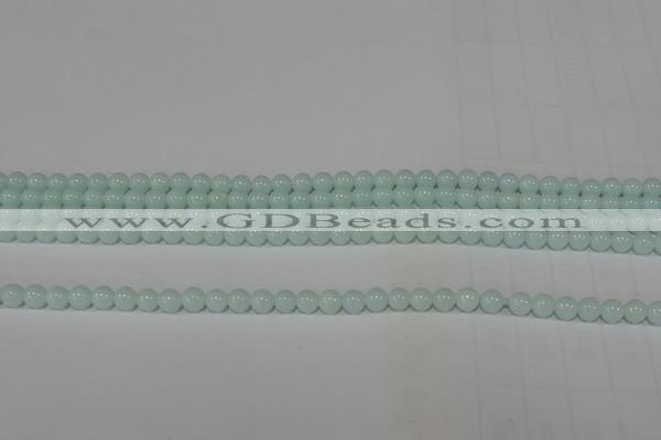 CTU2563 15.5 inches 4mm round synthetic turquoise beads