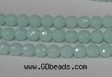 CTU2572 15.5 inches 6mm faceted round synthetic turquoise beads