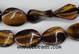 CTW63 15.5 inches 13*18mm twisted oval yellow tiger eye beads