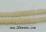 CYJ63 15.5 inches 6*7mm vase-shaped yellow jade gemstone beads wholesale