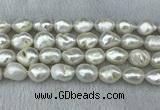 FWP312 15 inches 12mm - 13mm baroque white freshwater pearl strands