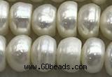 FWP322 15 inches 6mm - 7mm button white freshwater pearl strands