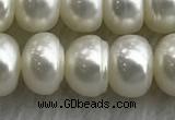 FWP324 15 inches 8mm - 9mm button white freshwater pearl strands