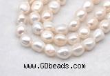 FWP504 14 inches 11mm - 12mm baroque white freshwater pearl strands