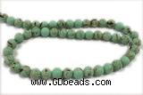 TURQ26 15 inches 4mm round synthetic turquoise with shelled beads